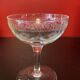 Early 20th century champagne glass burst by hand