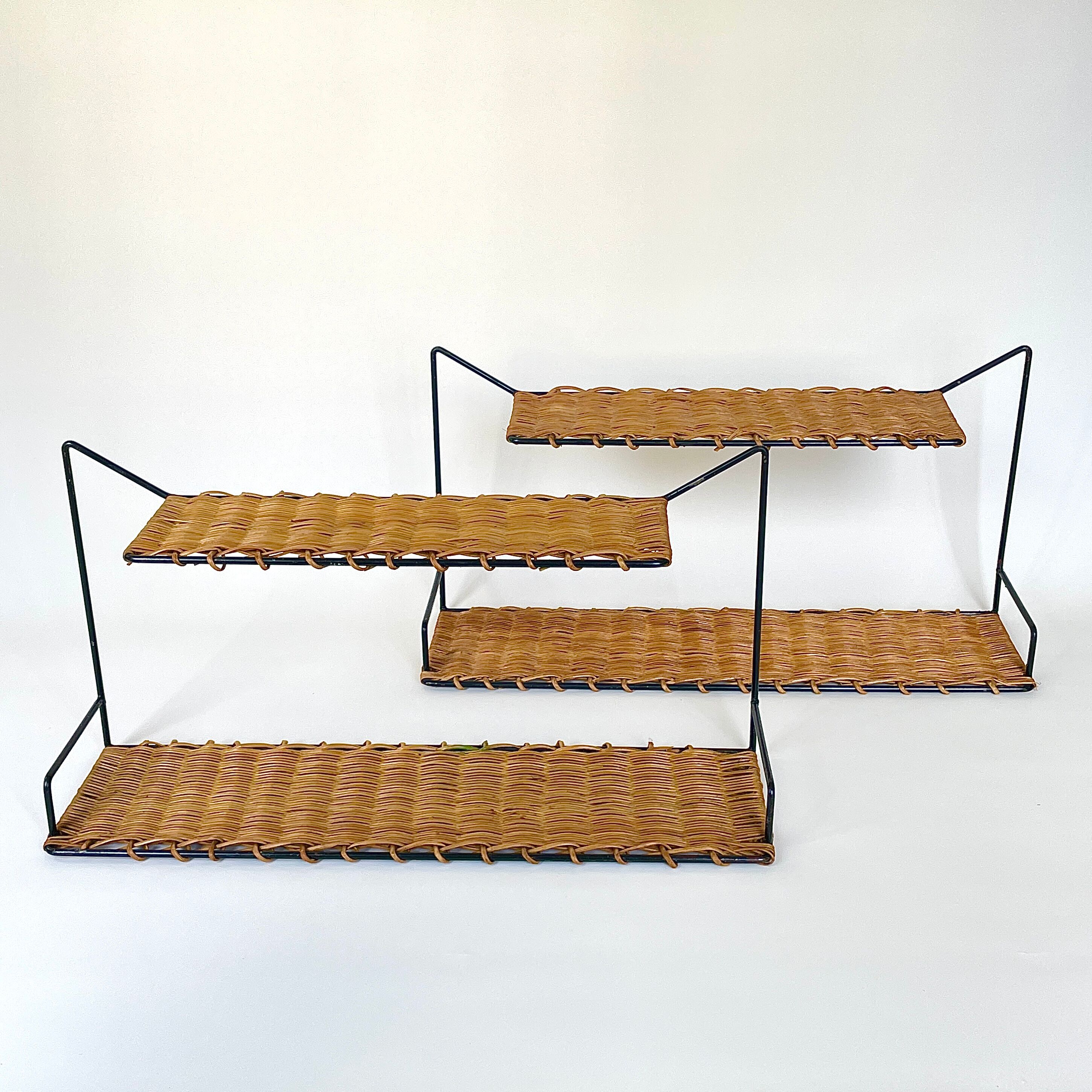 Pair of Raoul Guys wall shelves, 1950