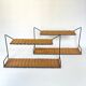 Pair of Raoul Guys wall shelves, 1950