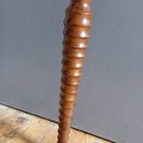 Vintage turned wooden candle holder, black metal candle base