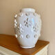 Large vase signed Emile Tessier with a lily flower design.