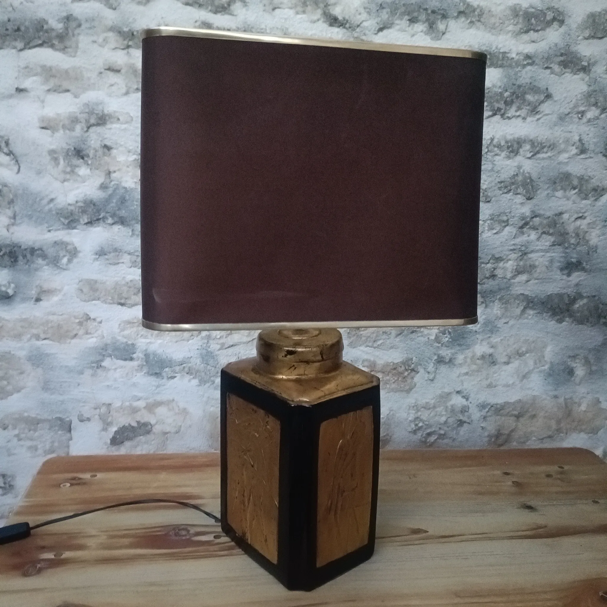 Large ceramic lamp with an Asian theme.