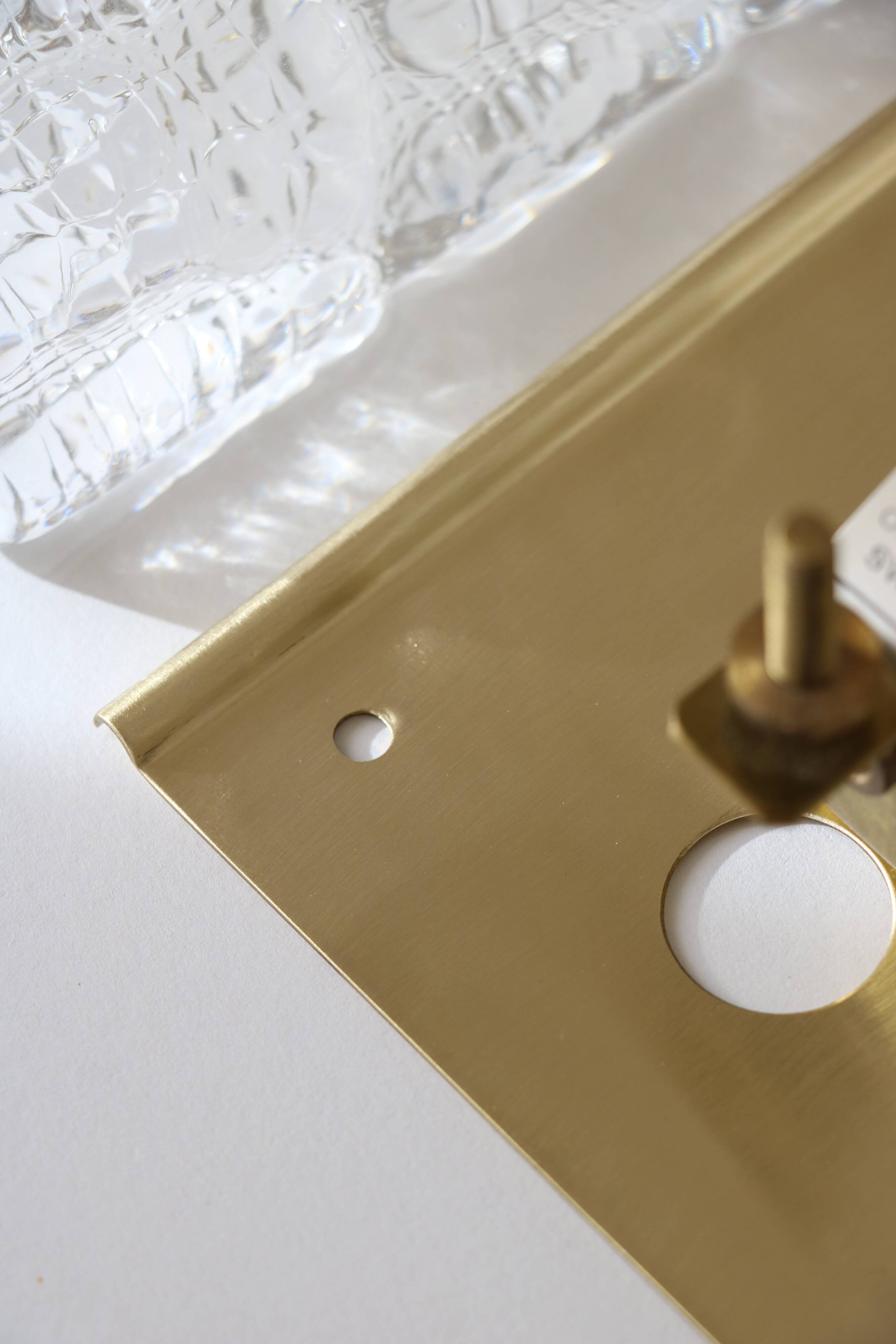 Pair of glass and brass wall lights by Carl Fagerlund for Orrefors, 1960.