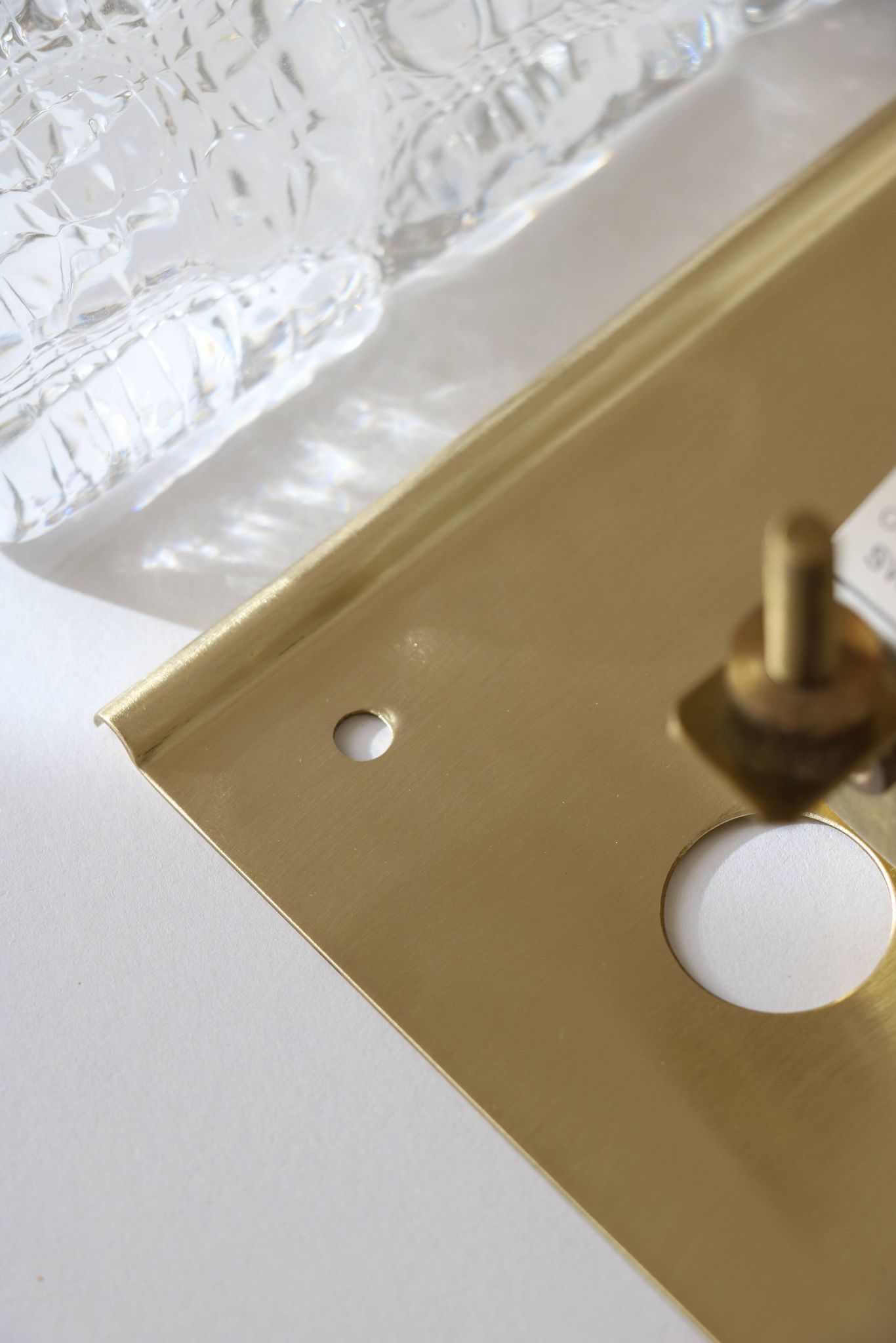 Pair of glass and brass wall lights by Carl Fagerlund for Orrefors, 1960.