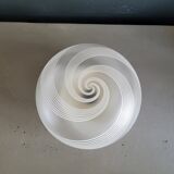 Frosted glass globe ceiling light with spiral patterns.