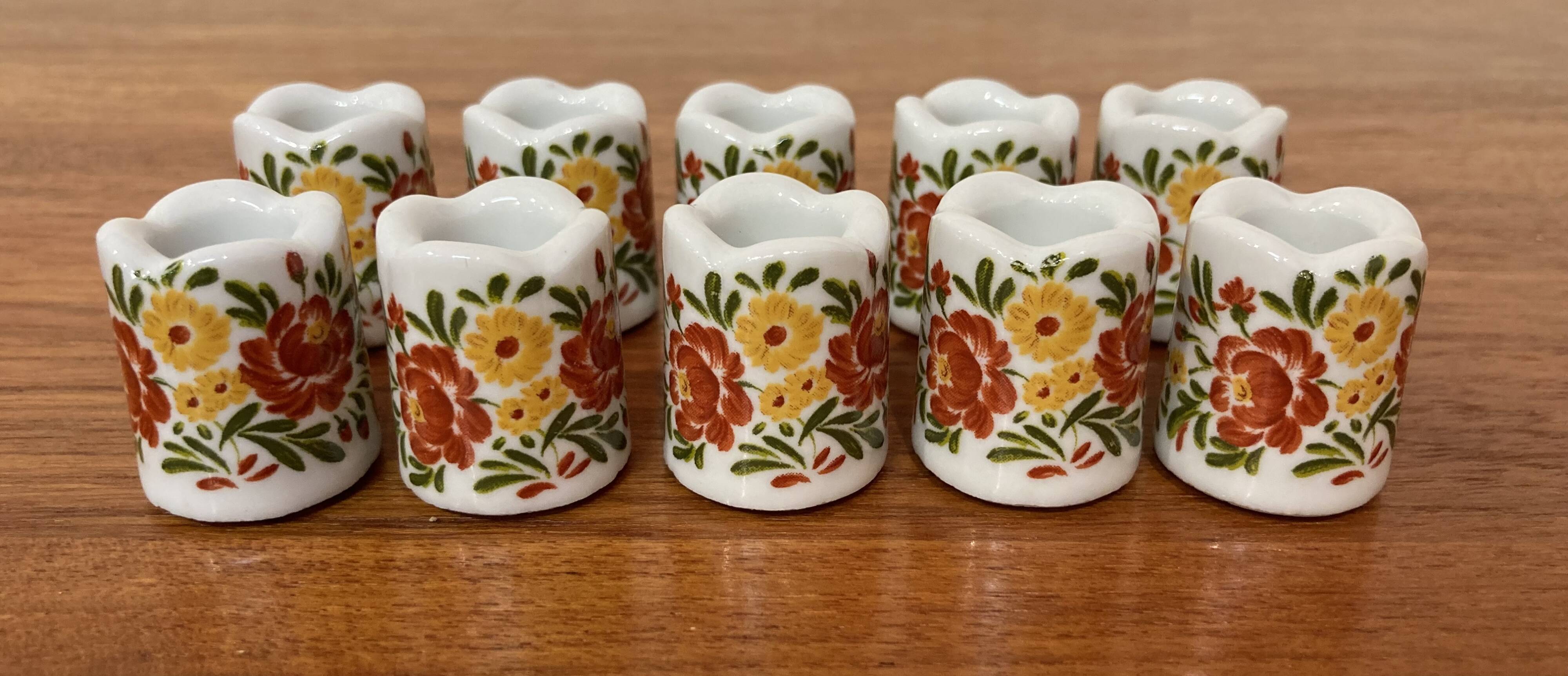 Set of ten 1950s design candle holders.