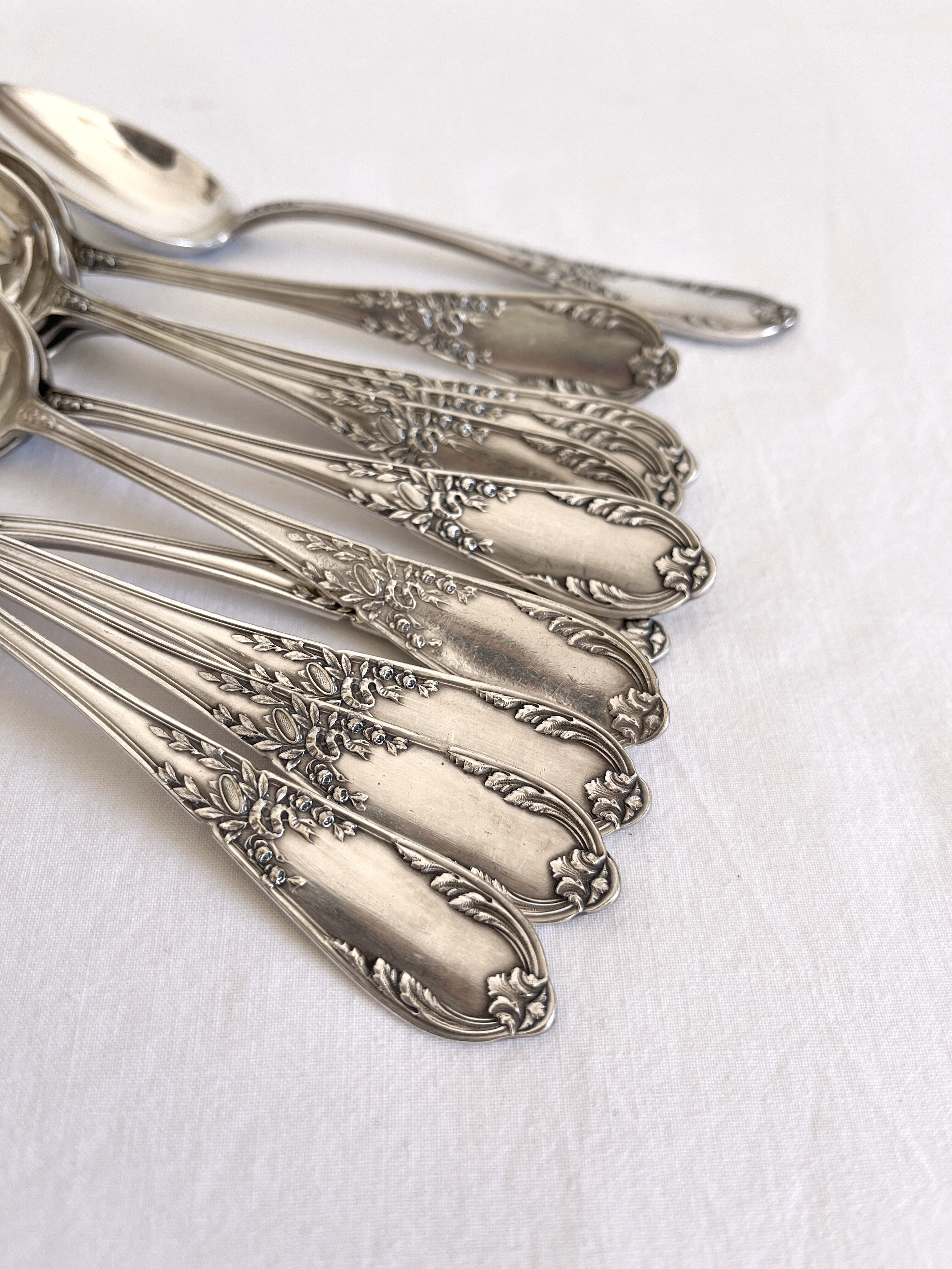 Set of 11 small vintage silver-plated metal spoons