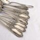 Set of 11 small vintage silver-plated metal spoons
