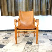 Safari chair in leather by Wilhelm Kienzle for Wohnbedarf, Switzerland 1950