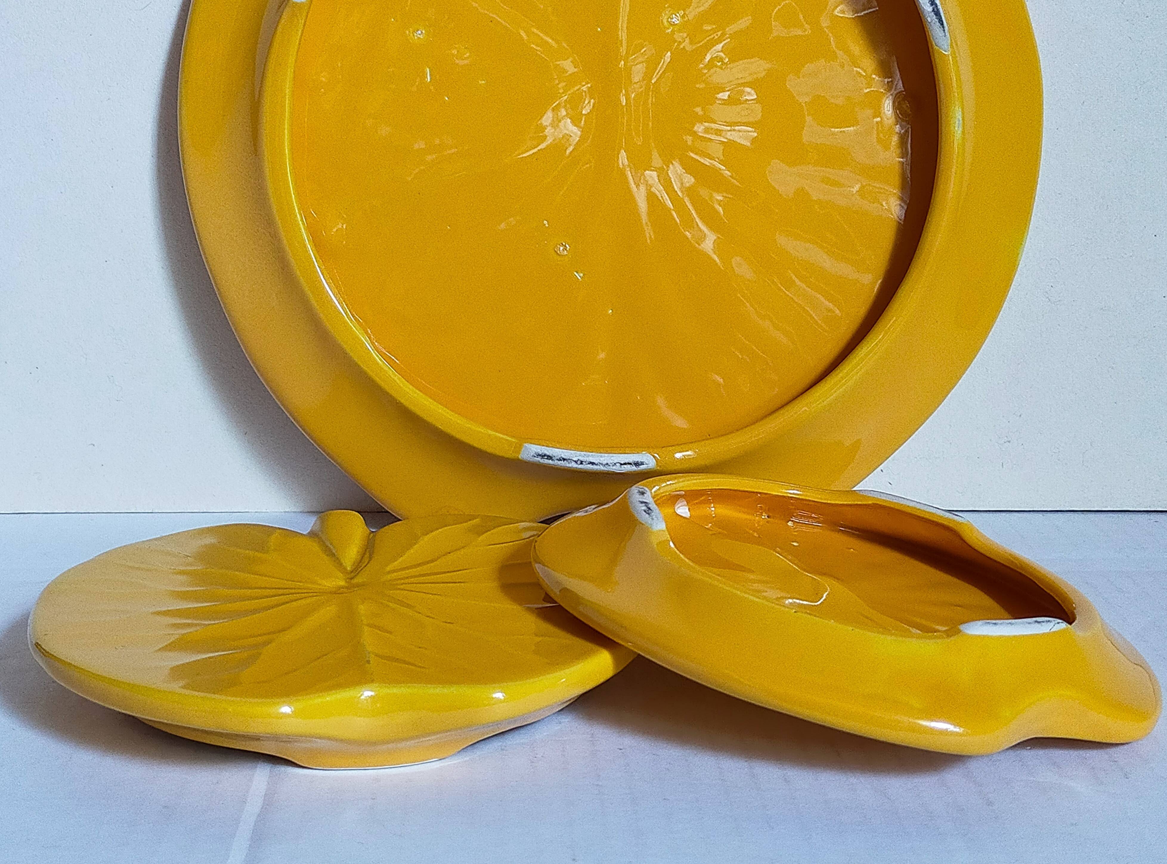 Three vintage water lily presentation dishes in slip