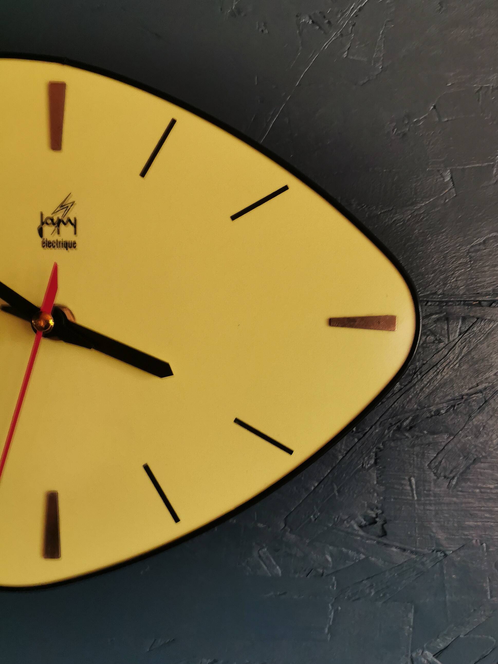 Vintage Formica clock silent asymmetrical wall pendulum "Yellow Japy"