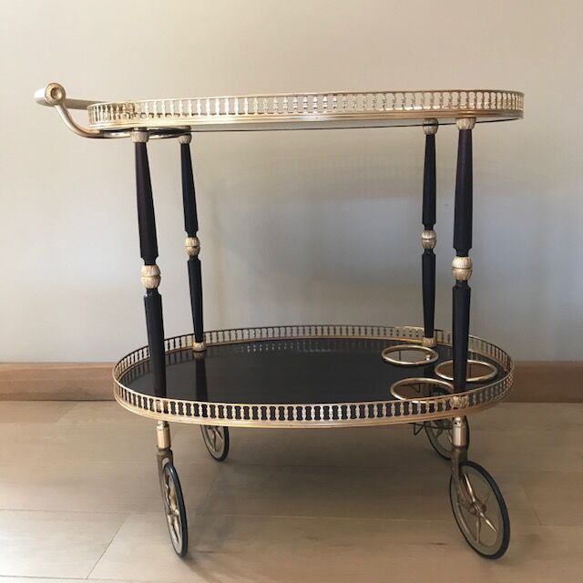 Golden wheeled serving trolley