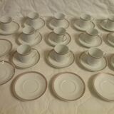 Cups and saucers in fine porcelain with gilded edging