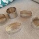 Set of 5 silver metal napkin rings