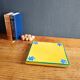 Yellow glazed ceramic trivet signed l. drimmer