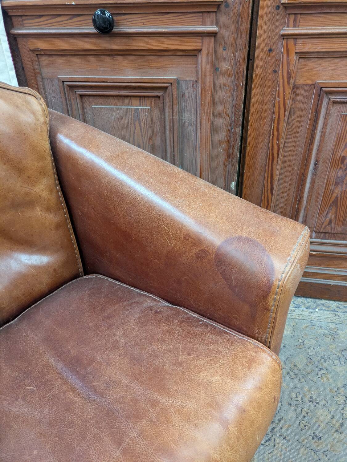 Pair of leather armchairs