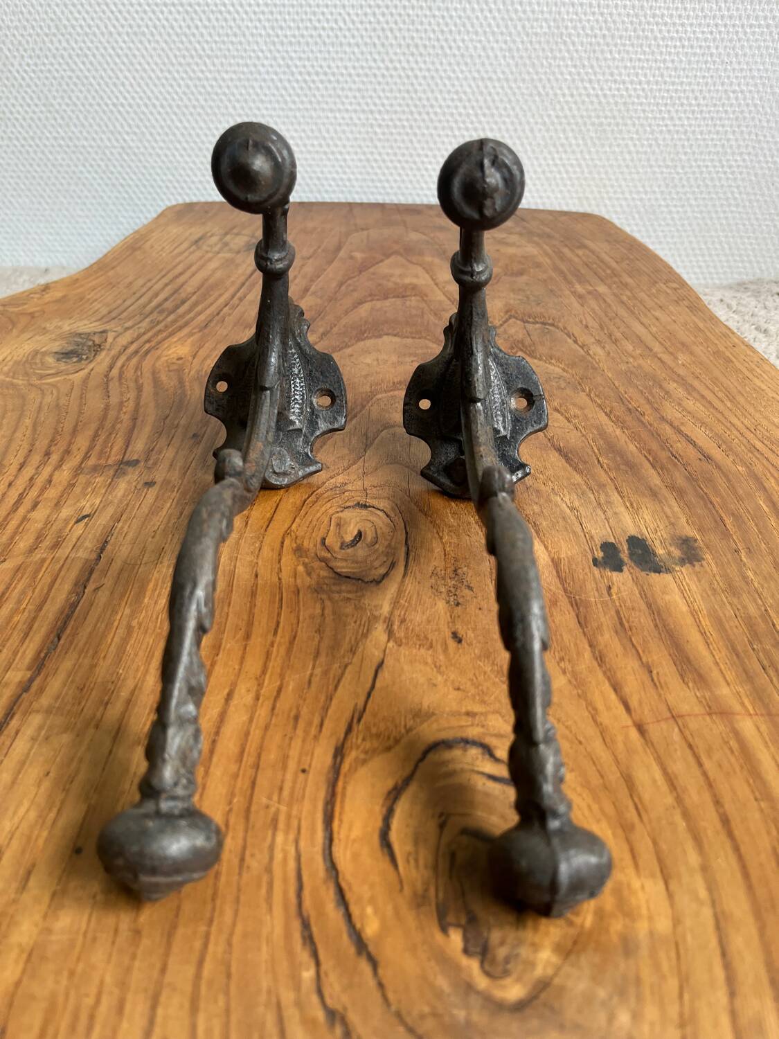 Pair of old cast iron coat hooks