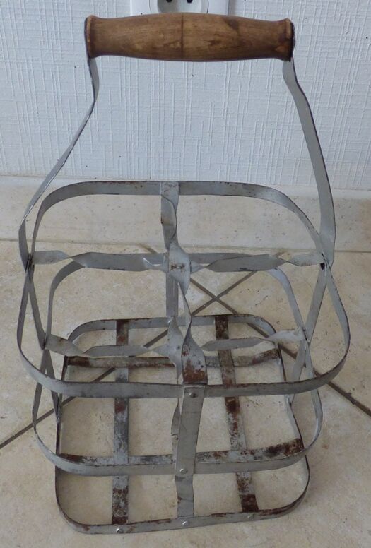 Antique metal bottle holder with wooden handle