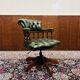 Fauteuil capitaine Chesterfield vert anglais classique