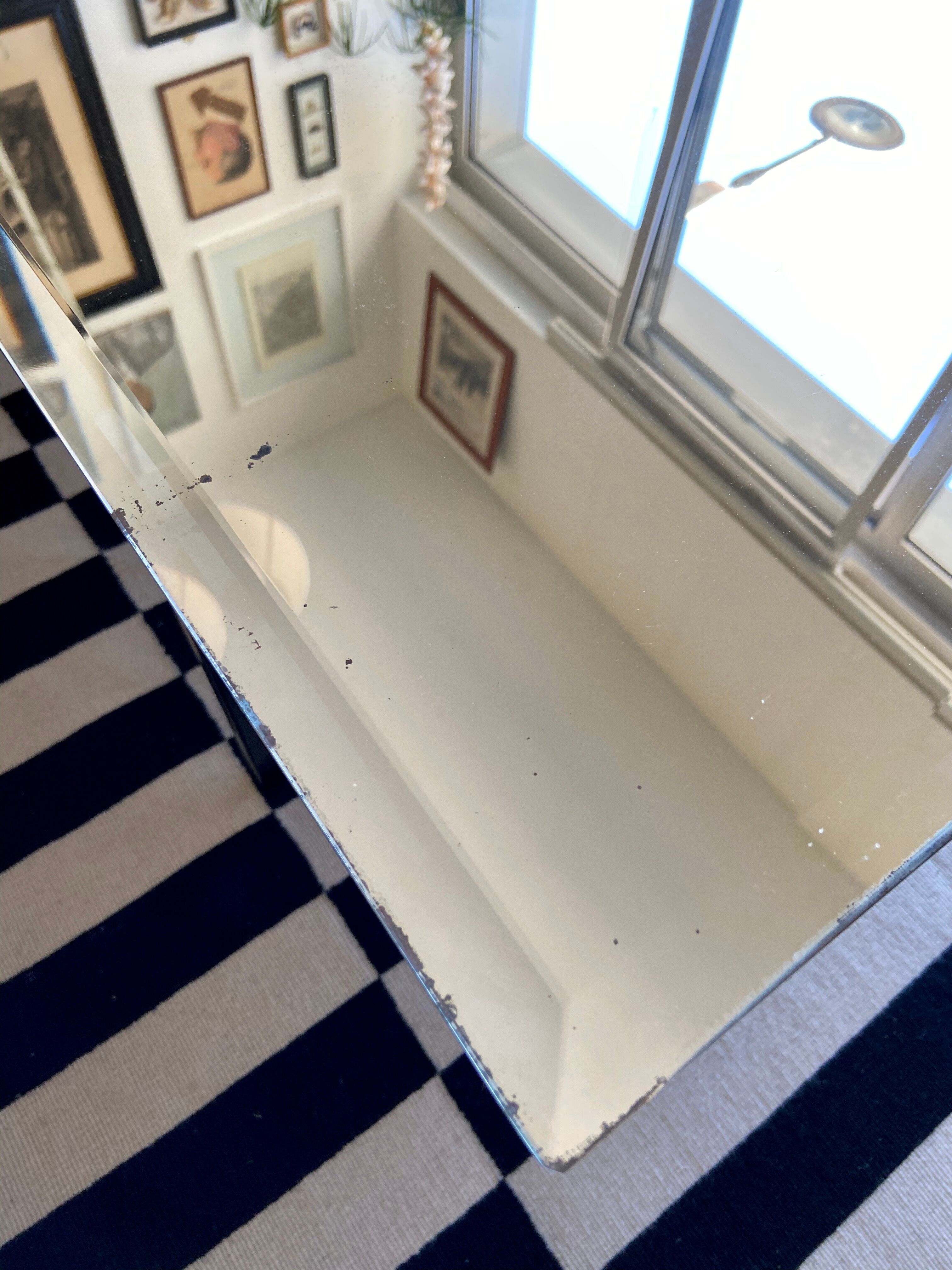 Bevelled mirror 63 x 100 cm