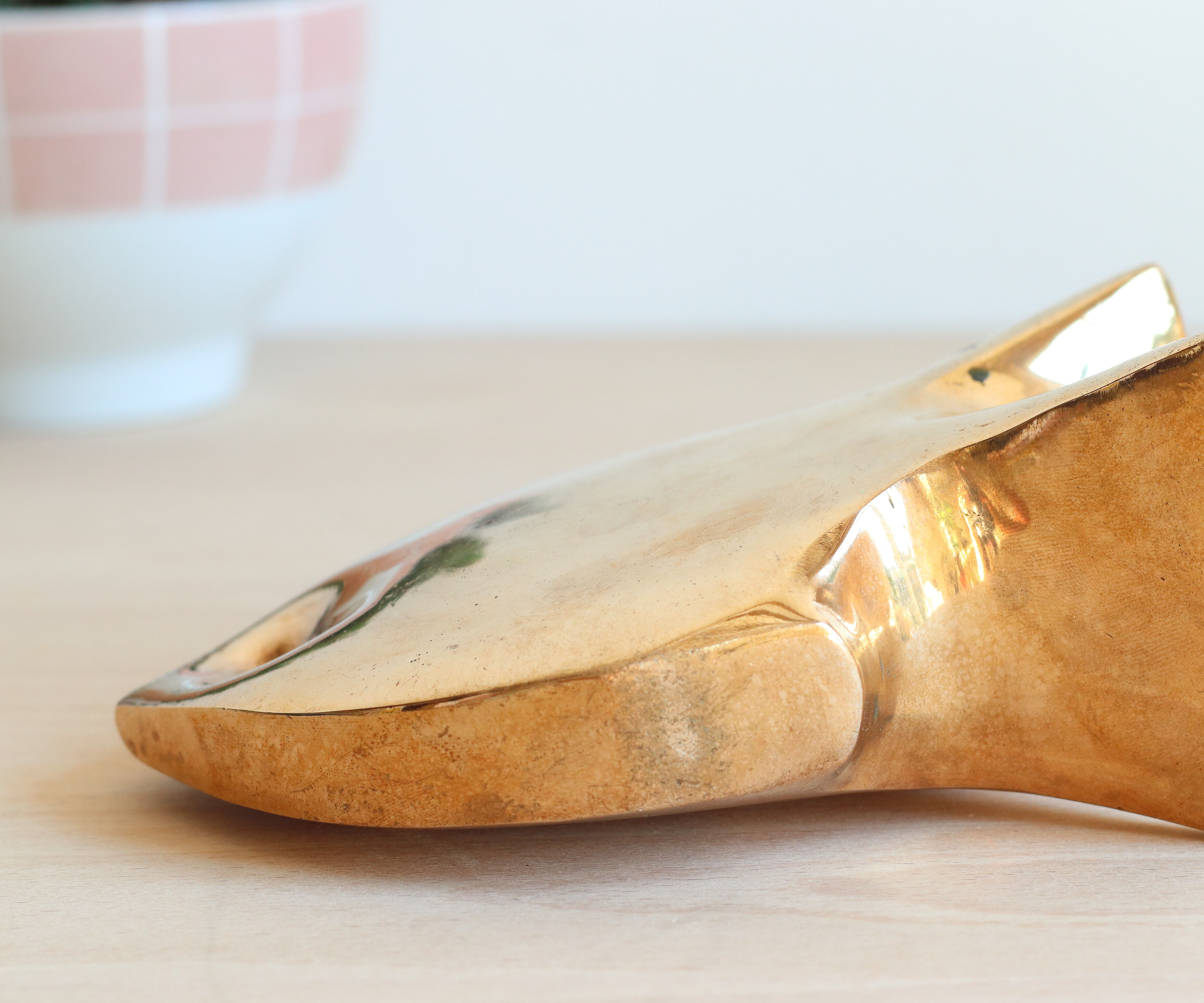 1960s solid brass ashtray in the shape of a stylized fish