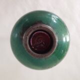 Green pot-bellied ceramic vase with foot and high, narrow neck in signed raku