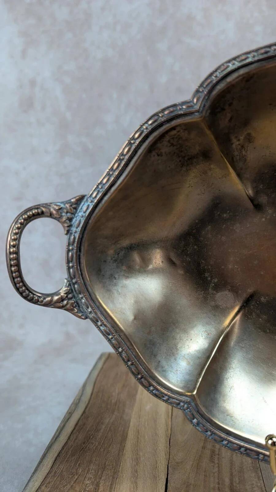 Antique oval silver-plated copper tray with handles.