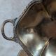 Antique oval silver-plated copper tray with handles.