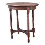 Candle holder side table with spool legs