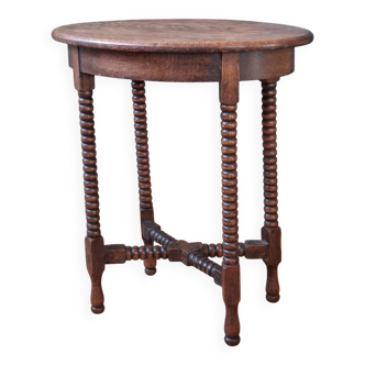 Candle holder side table with spool legs