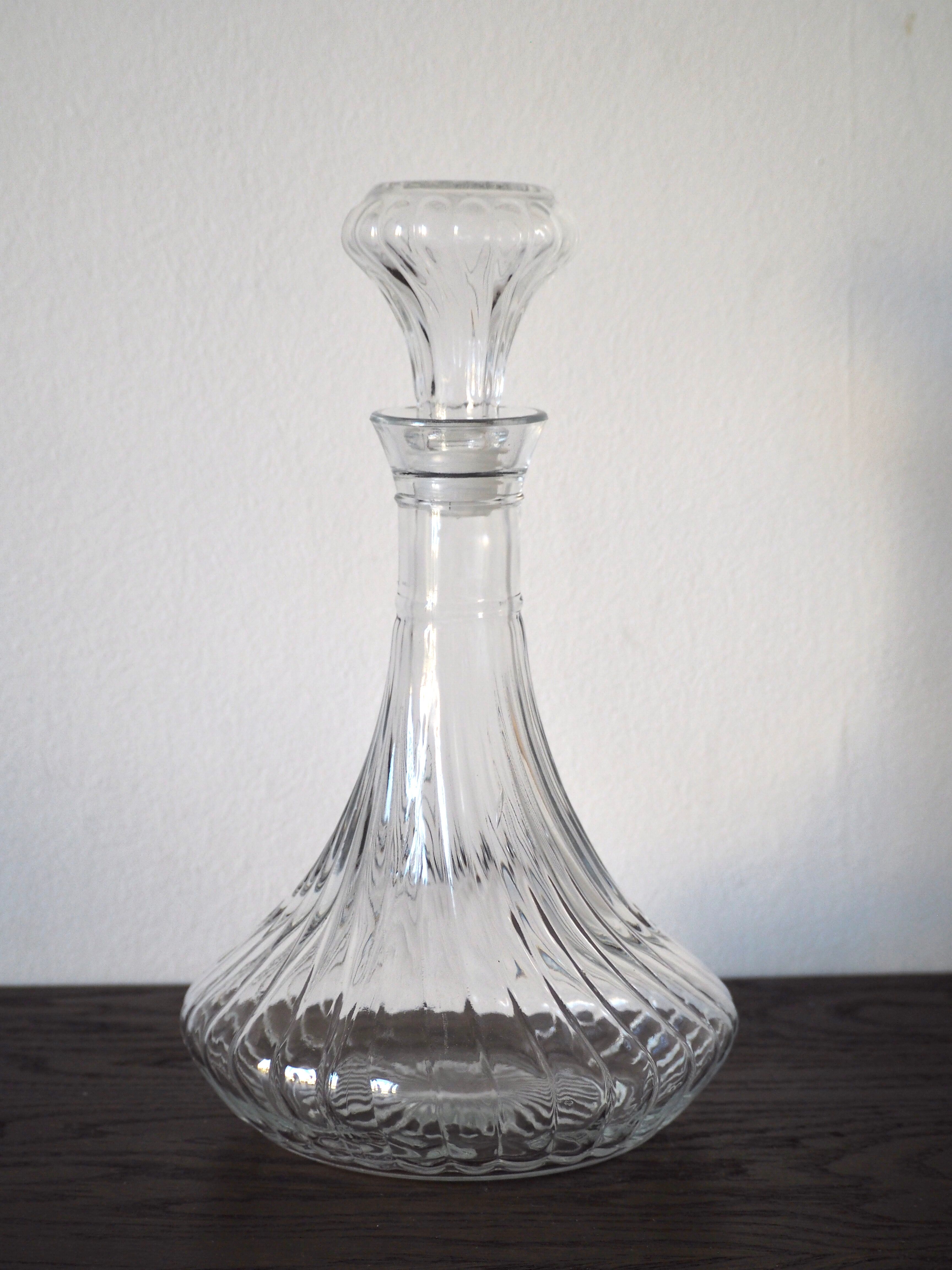 Scrolled glass wine decanter