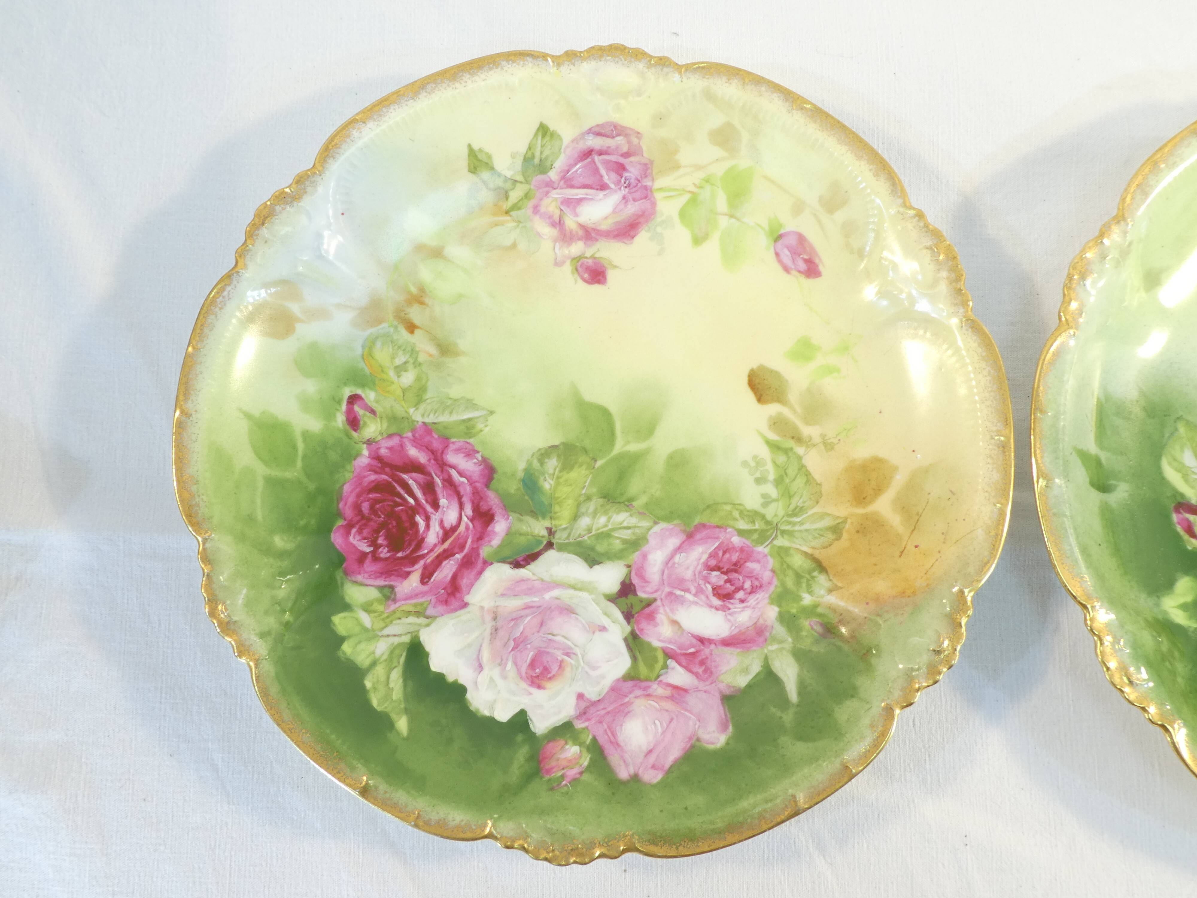 Pair of limoges porcelain plate ''Mandavy de mavaleix'' rose decoration