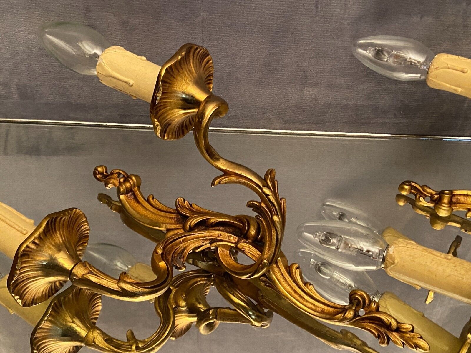 Pair of Louis XV style gilded bronze sconces