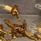 Pair of Louis XV style gilded bronze sconces