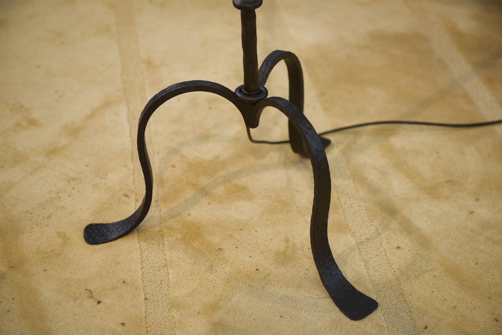 Wrought iron floor lamp in the style of the Marolles workshops from the 1950s.