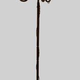 Floor lamp has three brass light arms
