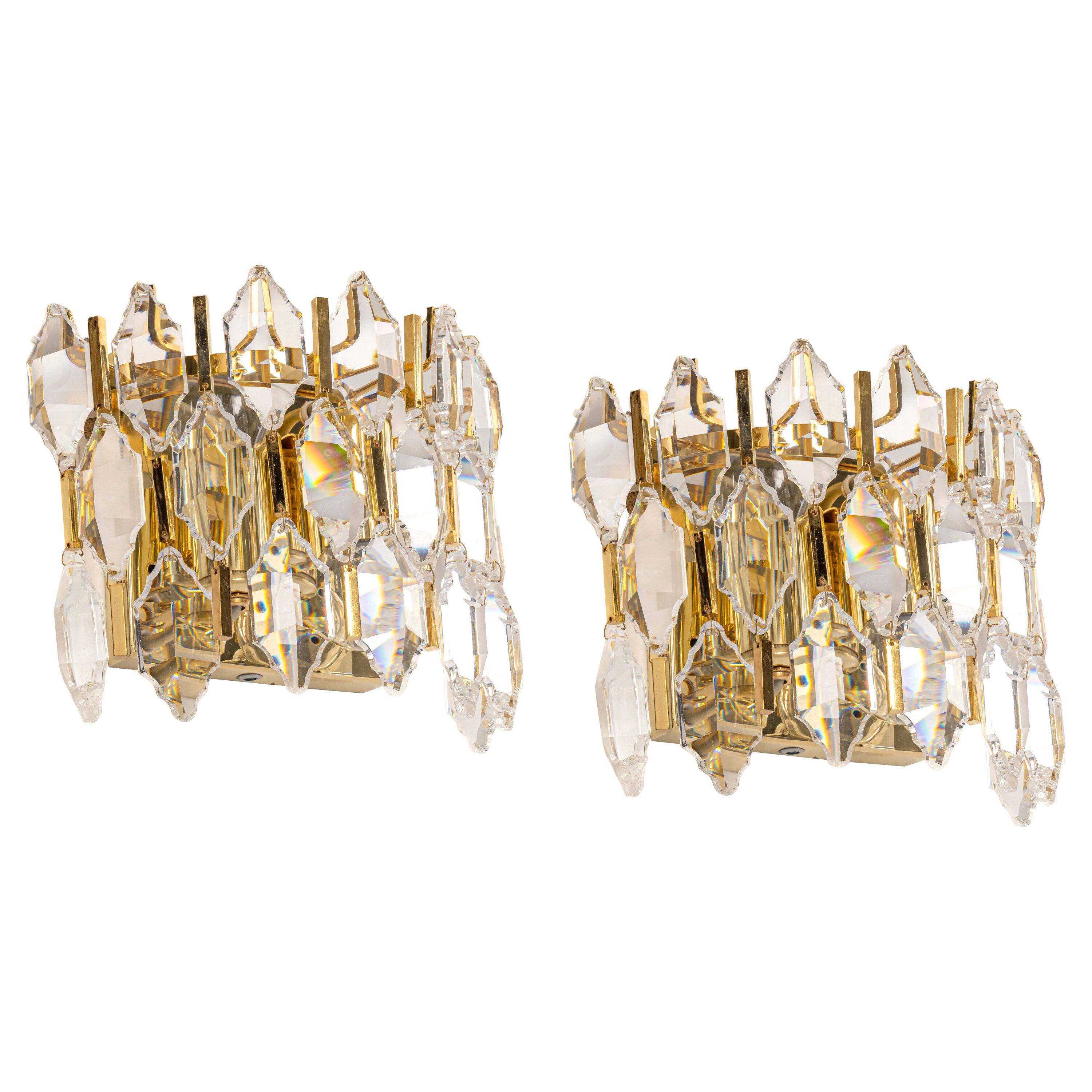 Pair of wall sconces in gilded brass and crystal by Palwa, Germany, 1970s.