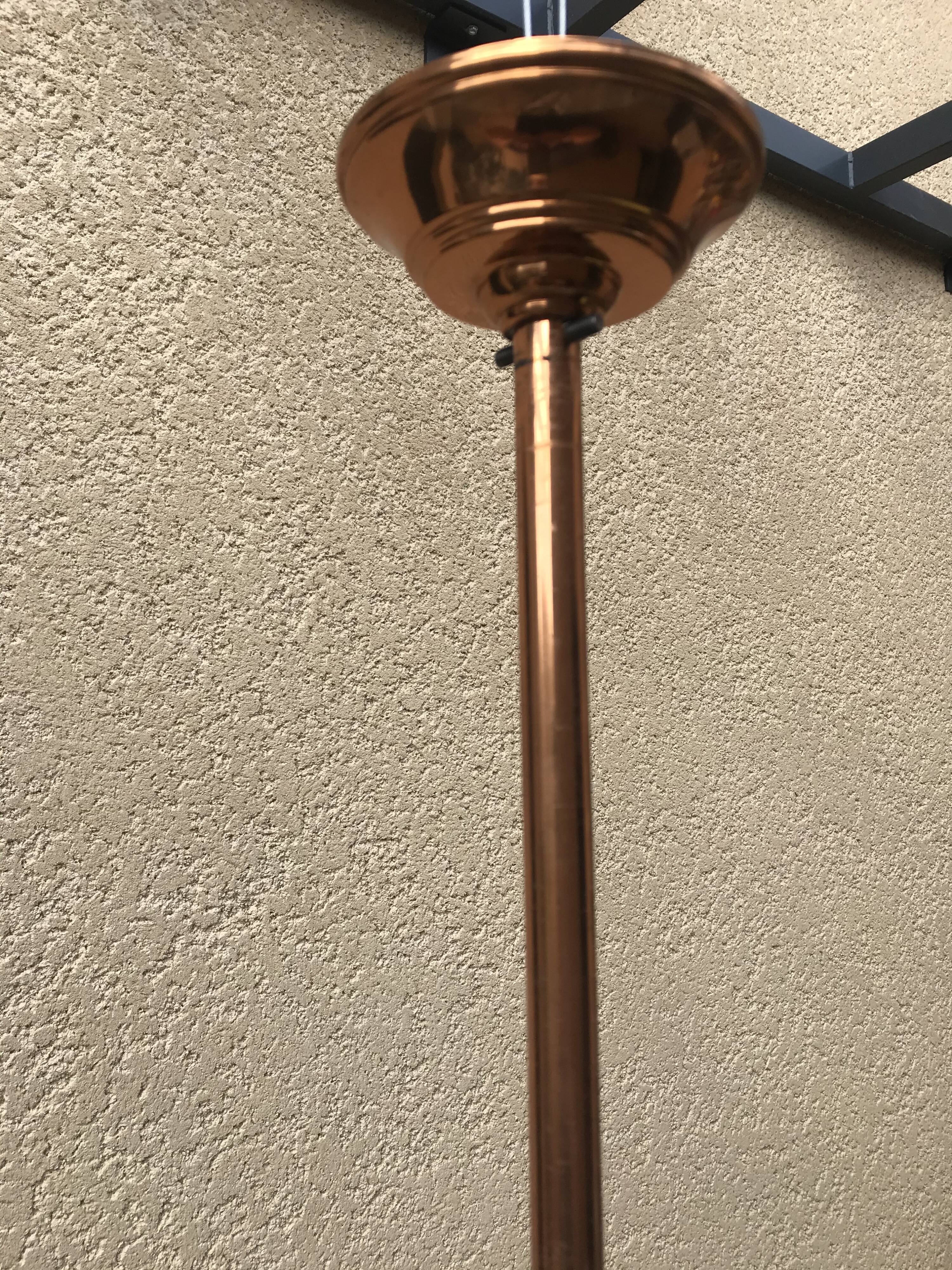 Copper and glass hanging lamp with his Ezan glass disc