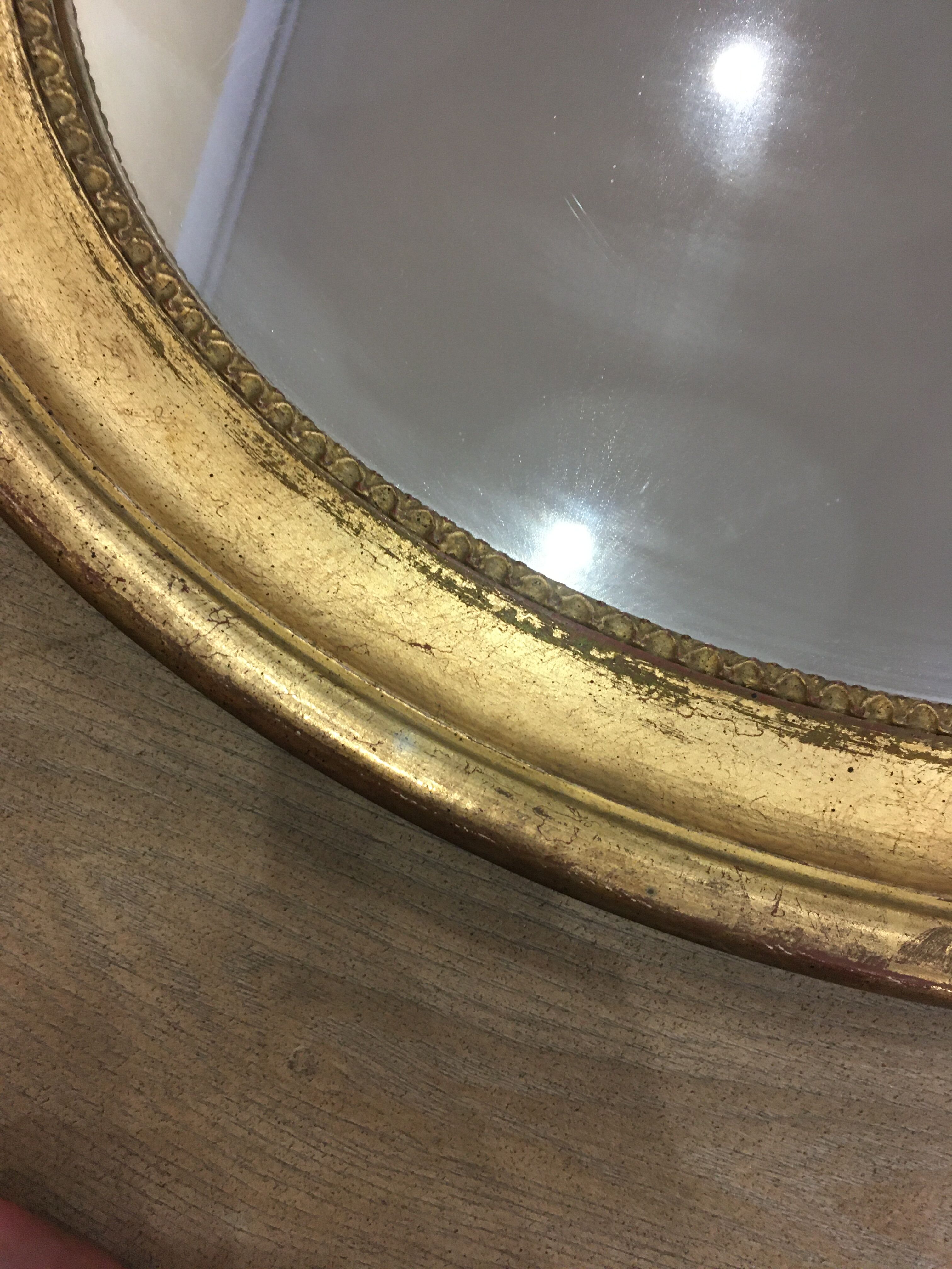 Old mirror gilded wooden frame.