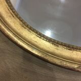 Old mirror gilded wooden frame.