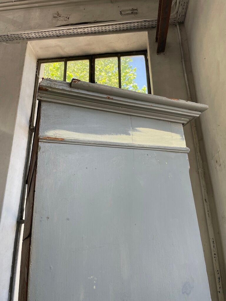 Blue patinated cap cabinet