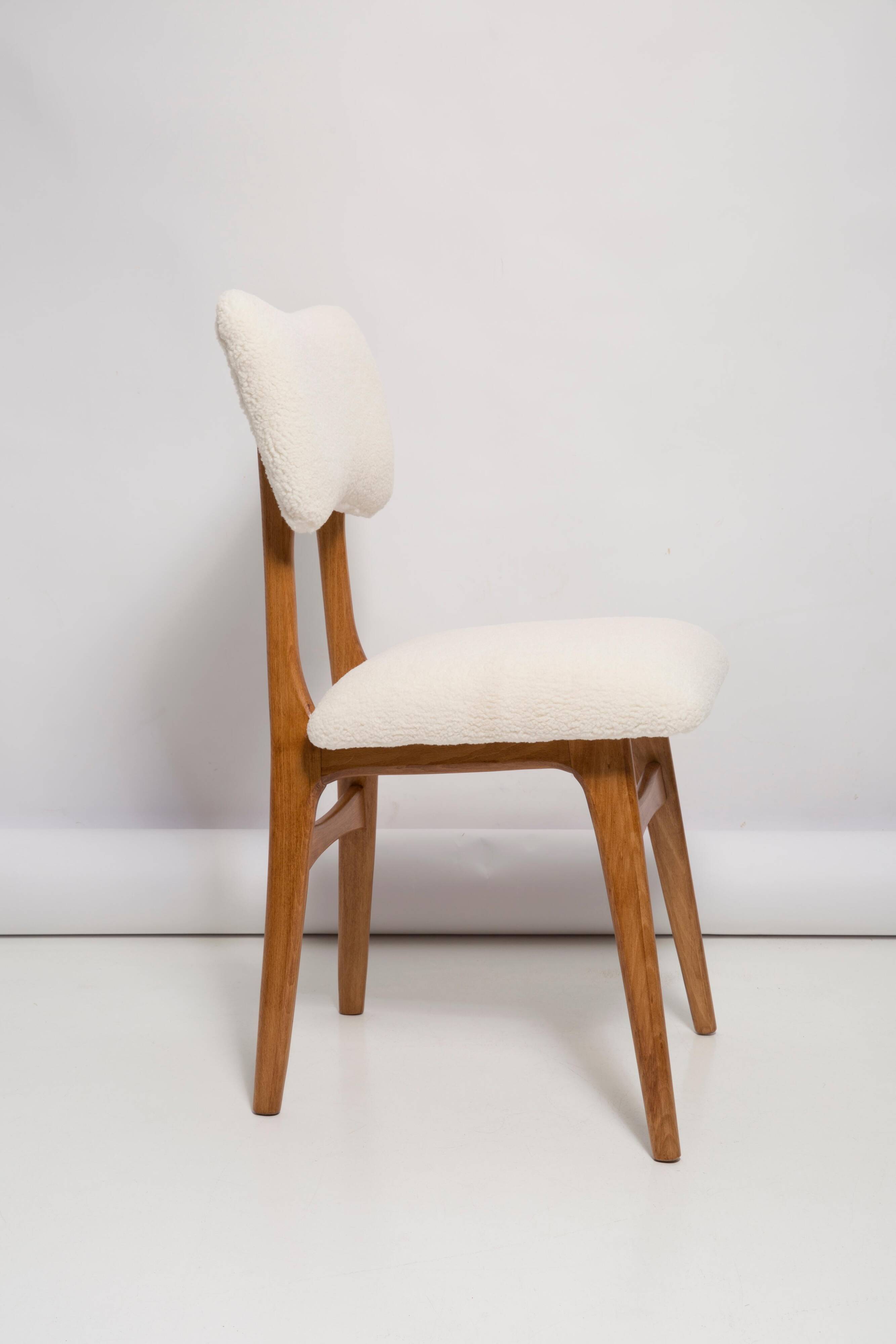 Butterfly chair in beech wood and cream boucle, Europe, 1960