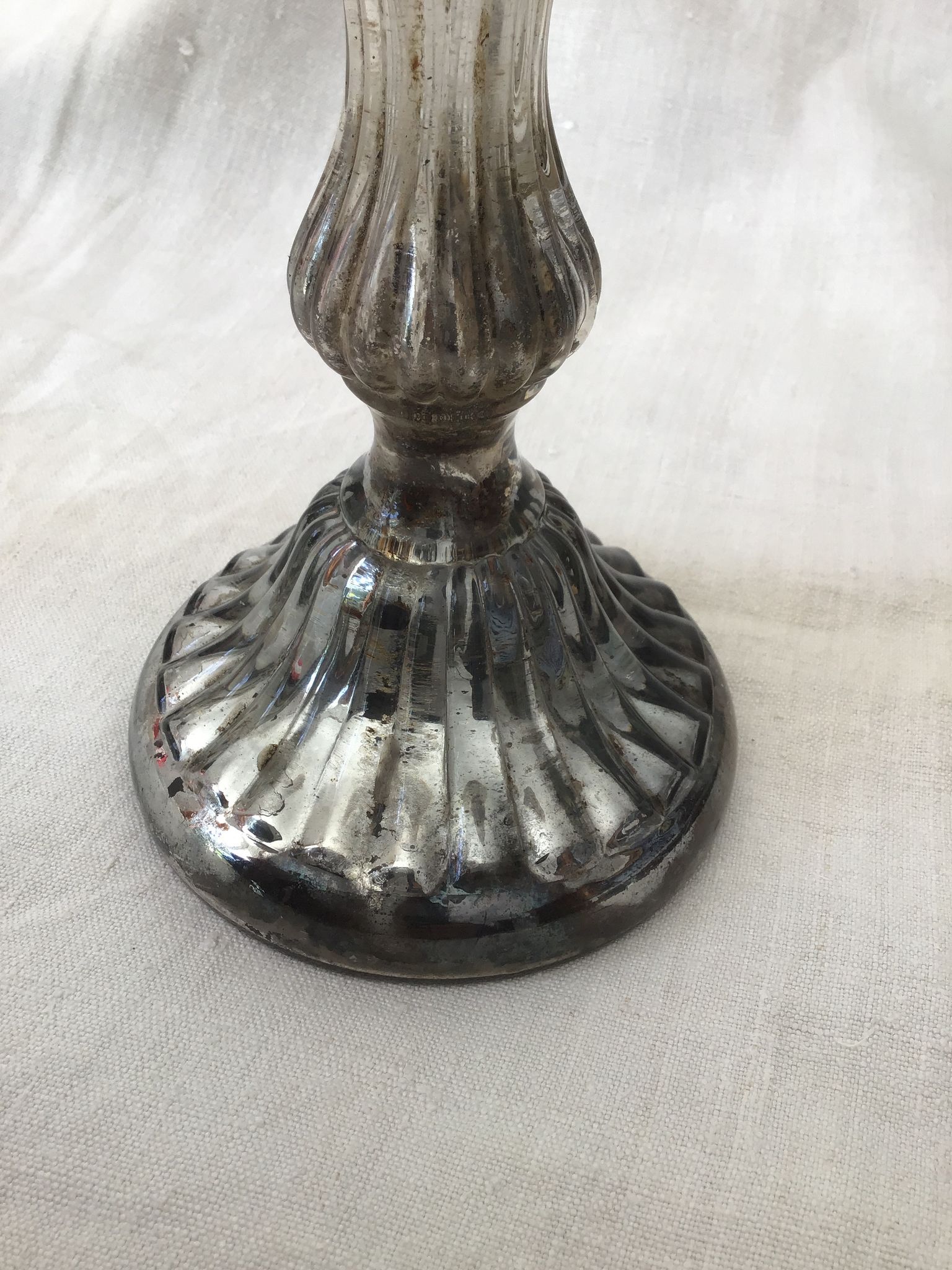 Eglolated glass candlestick