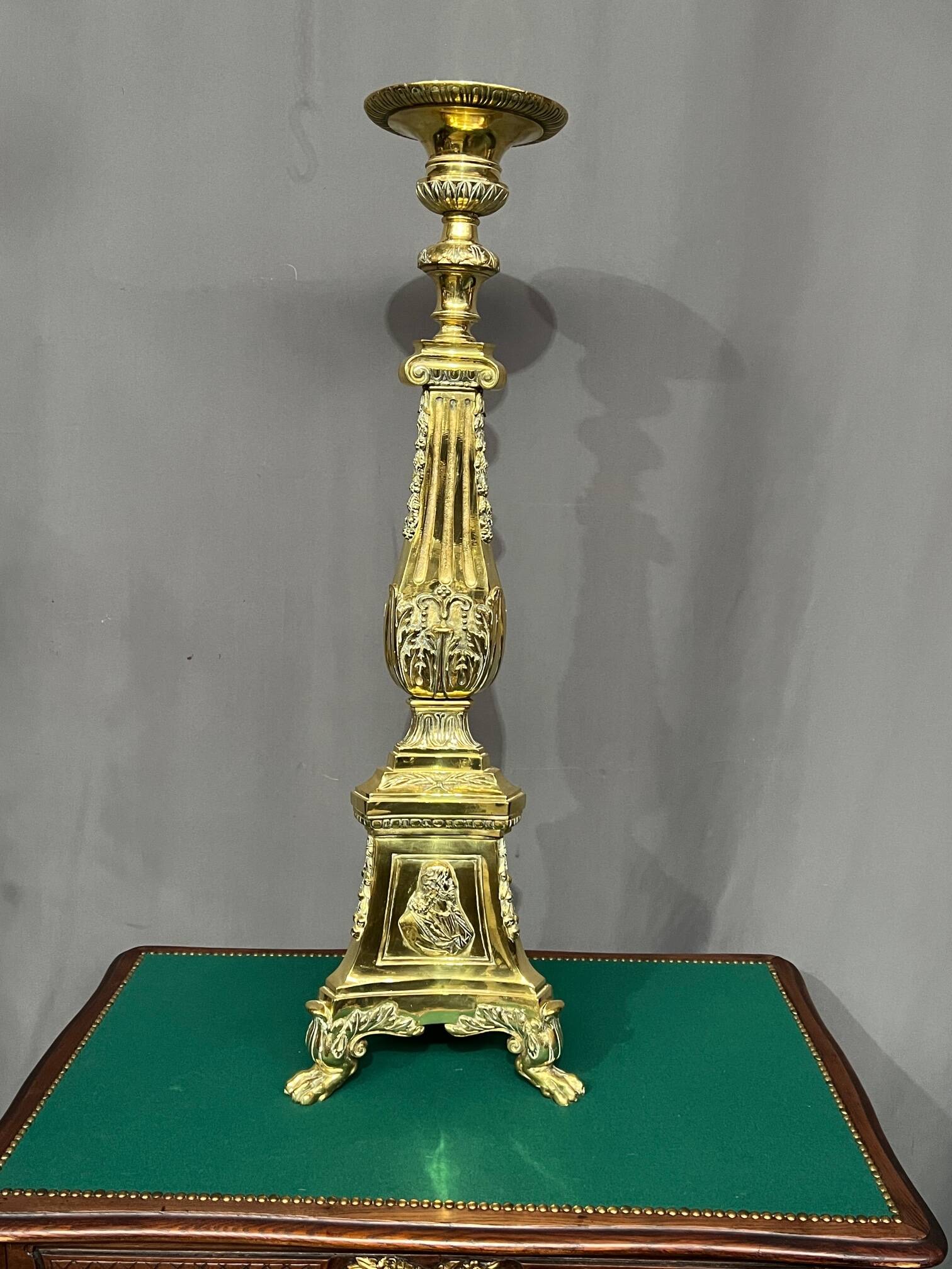 Large solid bronze floor candle holder.