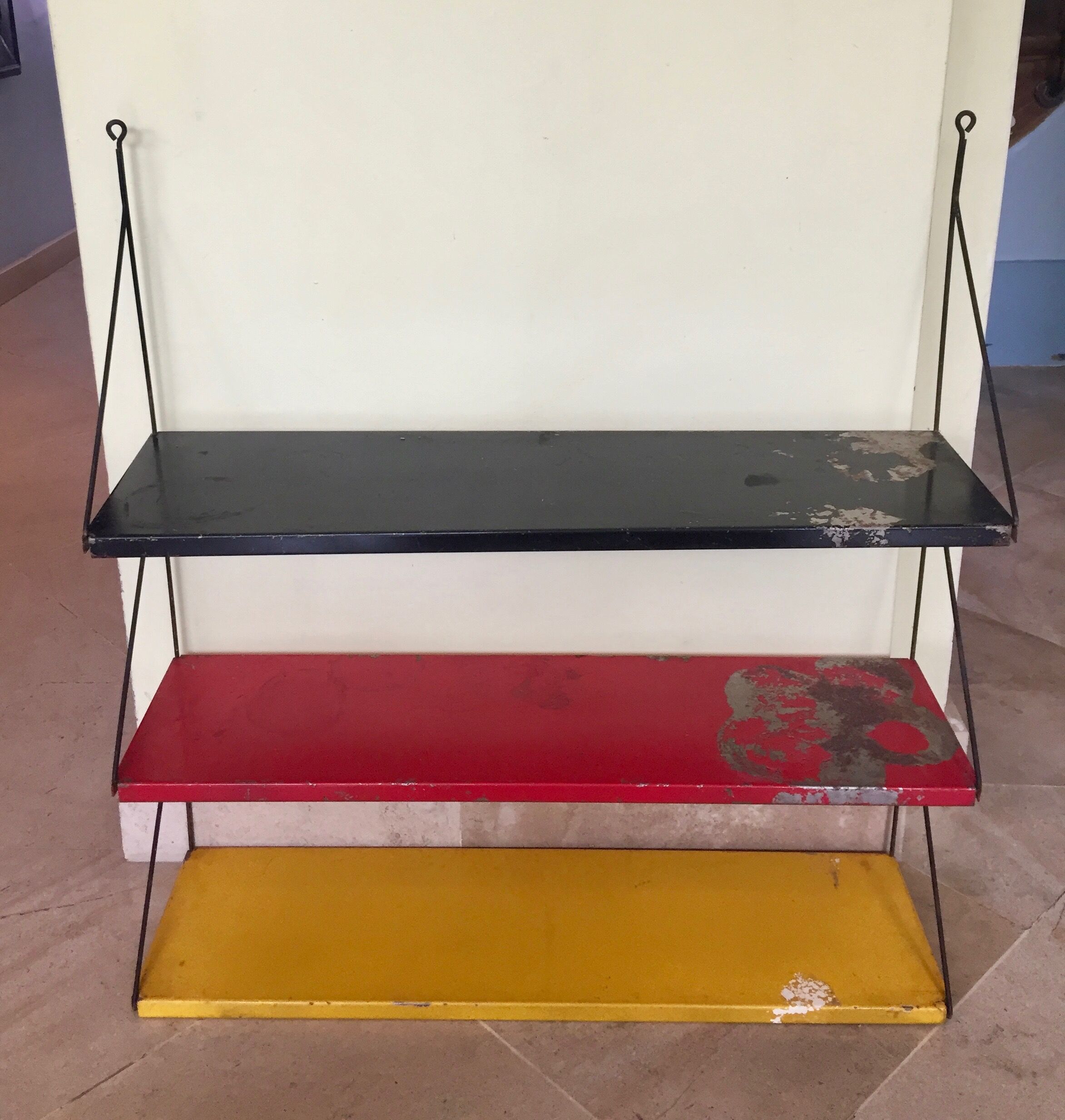 Old vintage shelves in teak and metal of the 50s