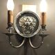 Pair of two-armed silver-plated bronze wall lights from Maison Charles, 1960.