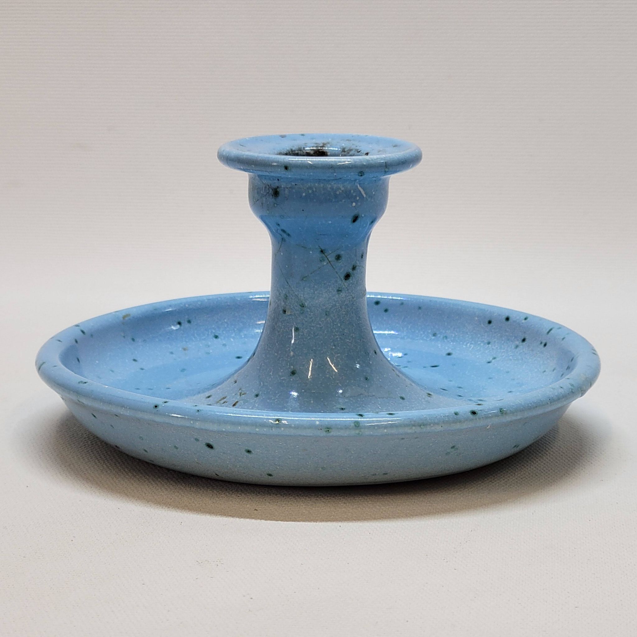 Light blue glazed ceramic candle holder with green speckled signed scorpion stamp