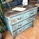 Antique commode with a patina in the Tuscan technique.
