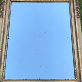 Antique mirror with gilded wood pediment, Louis XVI style