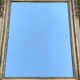 Antique mirror with gilded wood pediment, Louis XVI style